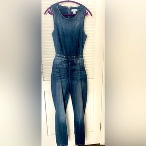 Guess Denim jump suit with back out.